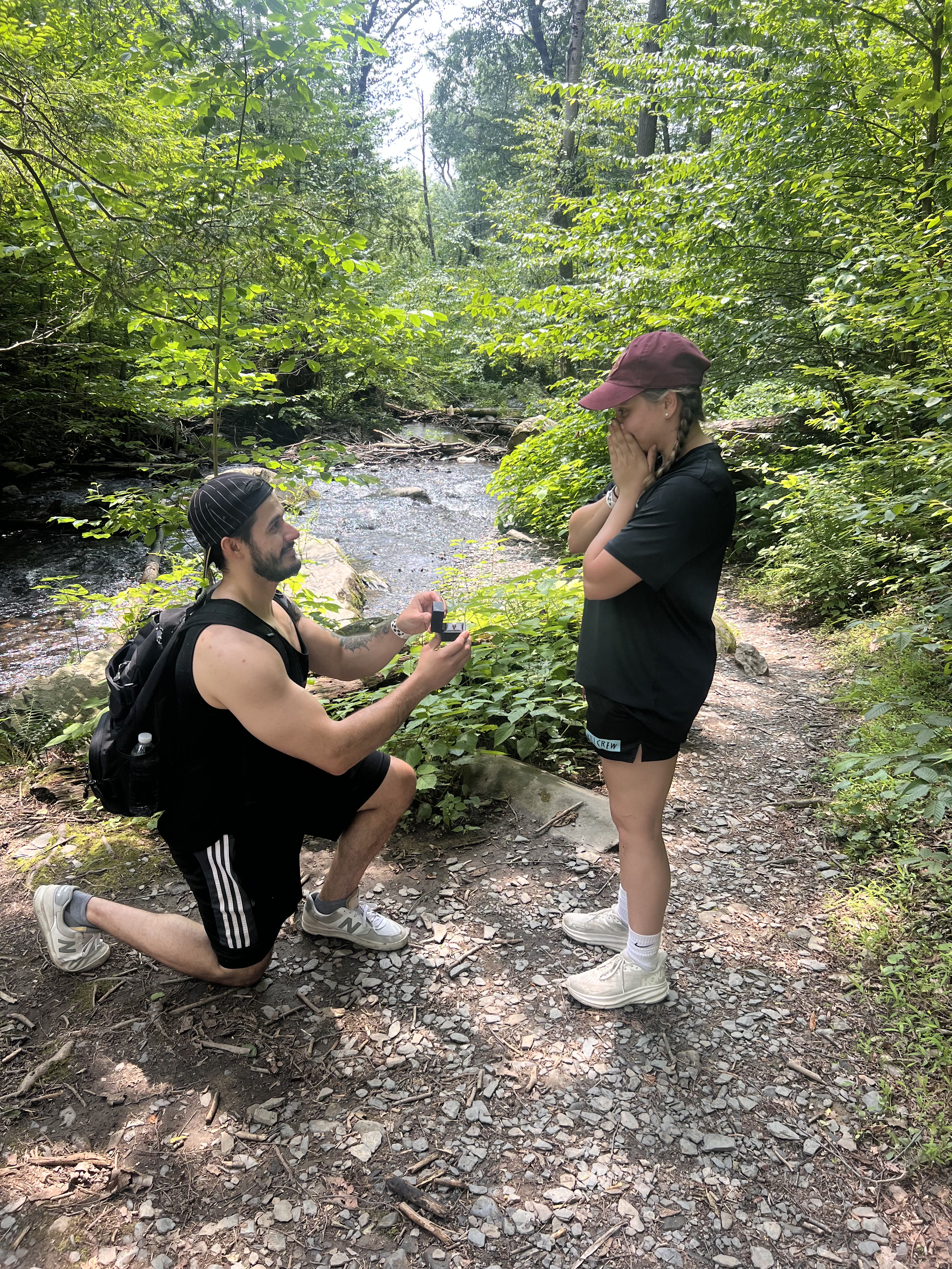 Charlie proposing to his fiancee Cait